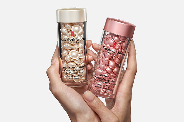 Hands holding Hyaluronic Acid Ceramide Capsules and Retinol Ceramide Capsules